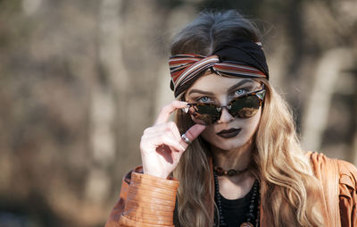 Young woman wearing sunglasses