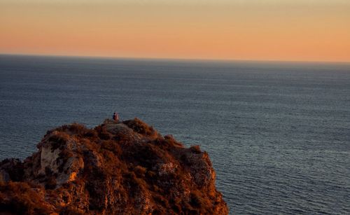 Scenic view of sea during sunset