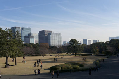 Buildings in city against sky