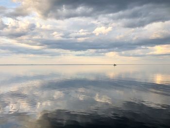 Scenic view of sea against sky at sunset