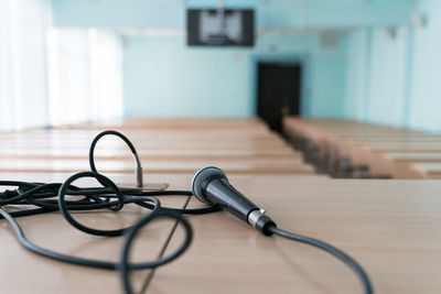 Close-up of telephone on table