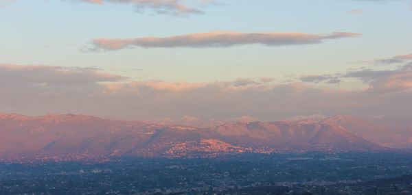 Scenic view of landscape against sky during sunset