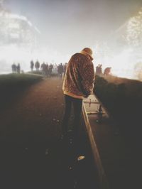 Close-up of woman standing in pond