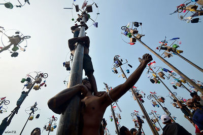 Low angle view of statue against sky