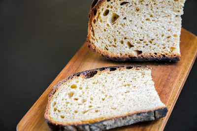 High angle view of bread on cutting board