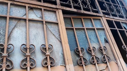 Low angle view of window on old building