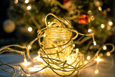 Close-up of illuminated light bulb