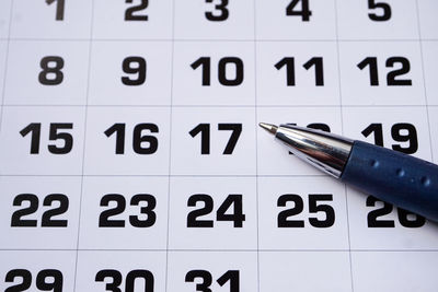 Close-up of text on calendar