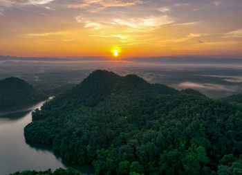 Scenic view of mountains against sky during sunset