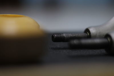 Close-up of piano keys on table