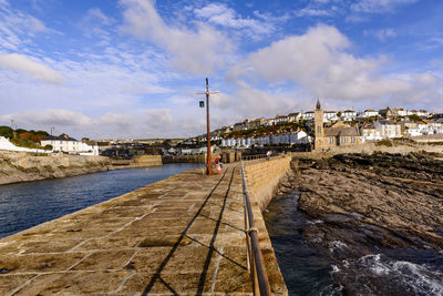 Bridge over river against sky