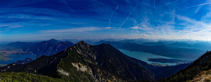 Panoramic view of mountains against blue sky