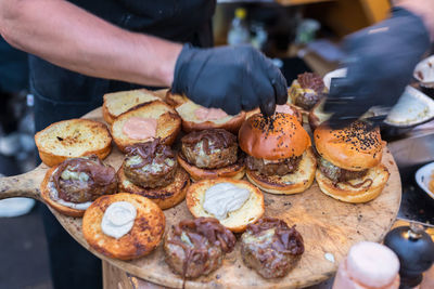 Close-up of man preparing food