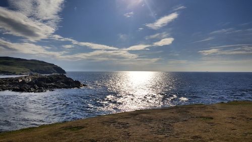 Scenic view of sea at sunset