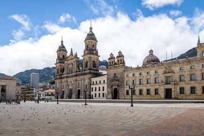 Buildings in city against sky