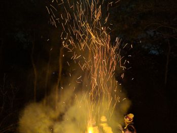 Firework display at night