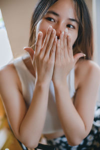 Young woman using mobile phone