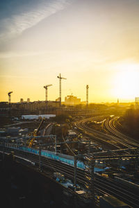 High angle view of railroad tracks against sky during sunset