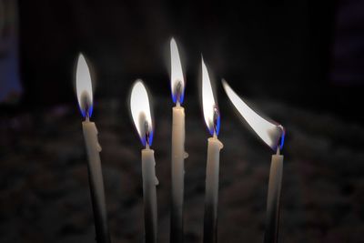 Close-up of burning candles