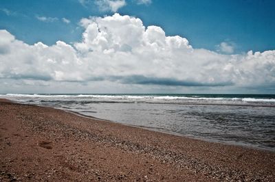 Scenic view of beach against sky