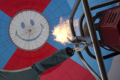 Low angle view of smiley on hot air balloon