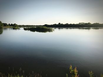 Scenic view of lake against clear sky