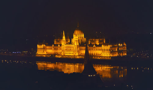 Illuminated city lit up at night