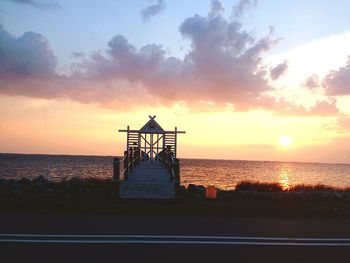 Scenic view of sea at sunset