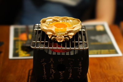 Close-up of drink served on table