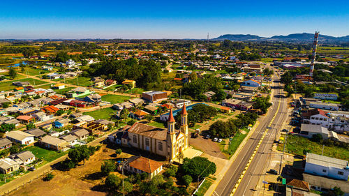 High angle view of buildings in city against sky