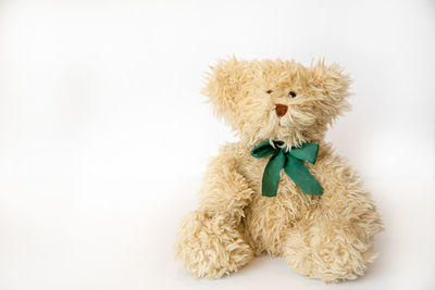 Close-up of stuffed toy against white background