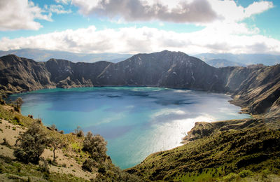 Panoramic view of lake against cloudy sky