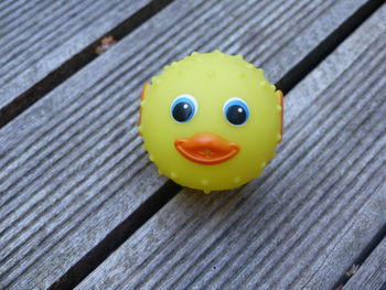 Close-up of rubber duck on table