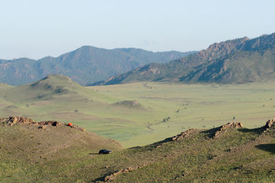 Scenic view of field against sky