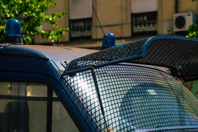 Close-up of blue car on table