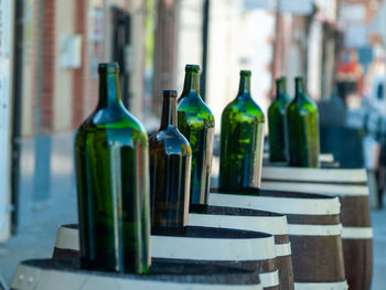 Close-up of wine bottles on table