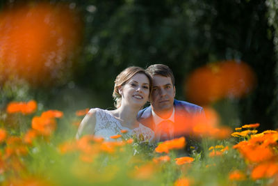 Portrait of bride and groom at park