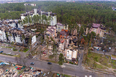 The aerial view of the destroyed and burnt buildings. 