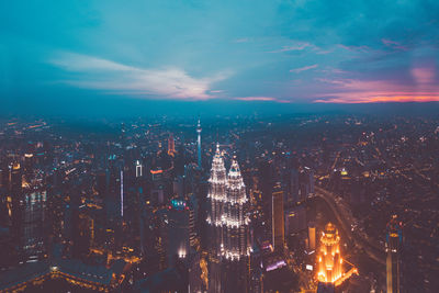 High angle view of city buildings at night