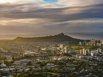 Aerial view of town against sky