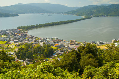 High angle view of townscape by river