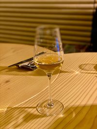 Close-up of wine in glass on table