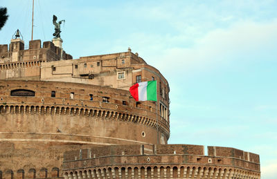 Italian flag waving outside castel sant'angelo in rome