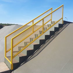 Low angle view of staircase against sky