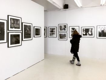 Full length of woman standing in museum