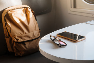 High angle view of personal accessories on table