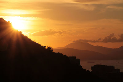 Scenic view of mountains against sky during sunset