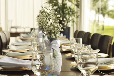 Place setting on dining table in restaurant