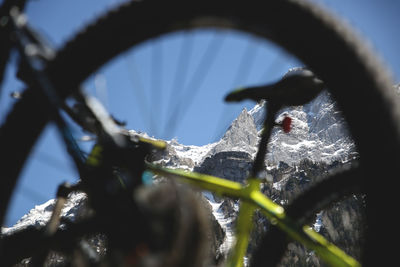 Close-up of bicycle wheel during winter