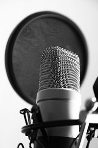 A studio microphone with black filter, image without color